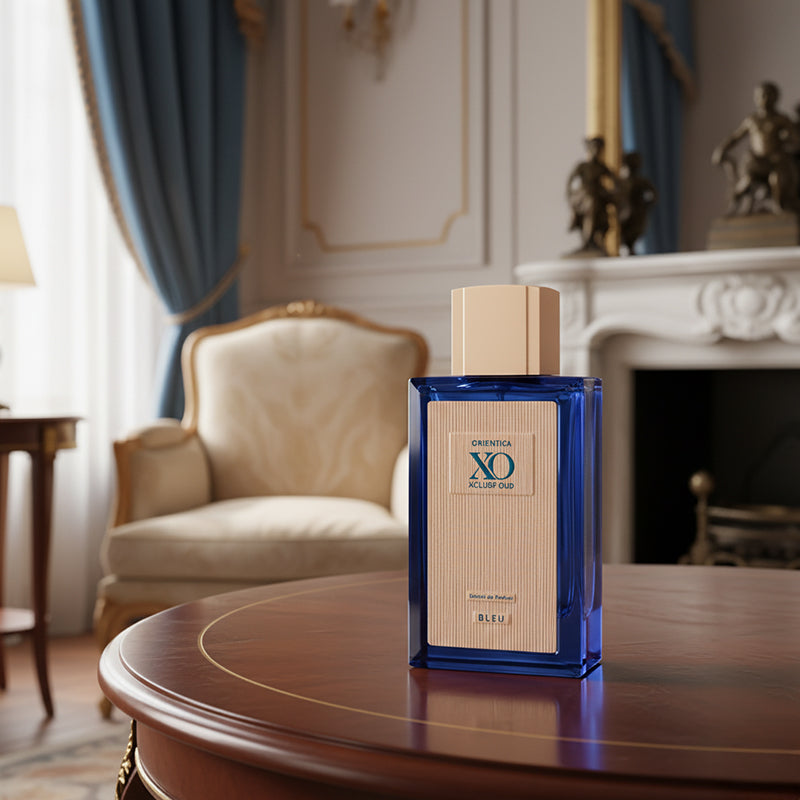 Xclusif Oud BLEU Front Fragrance Bottle in Luxury Room
