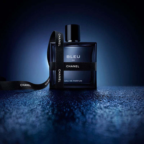 Chanel Bleu de Chanel Fragrance Bottle with a Brand Ribbon around it.