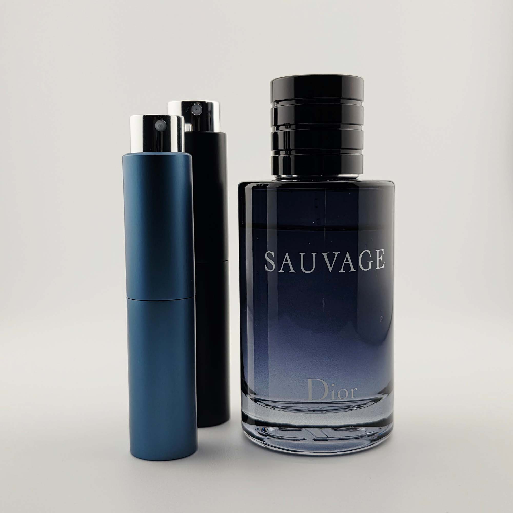 Dior Sauvage bottle with two travel-size decant atomizers in blue and black