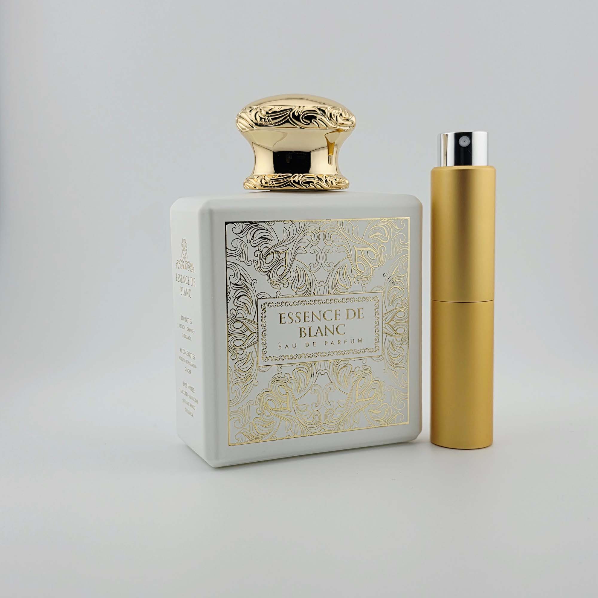 Essence de Blanc by Fragrance World with gold travel atomizer, angled studio shot