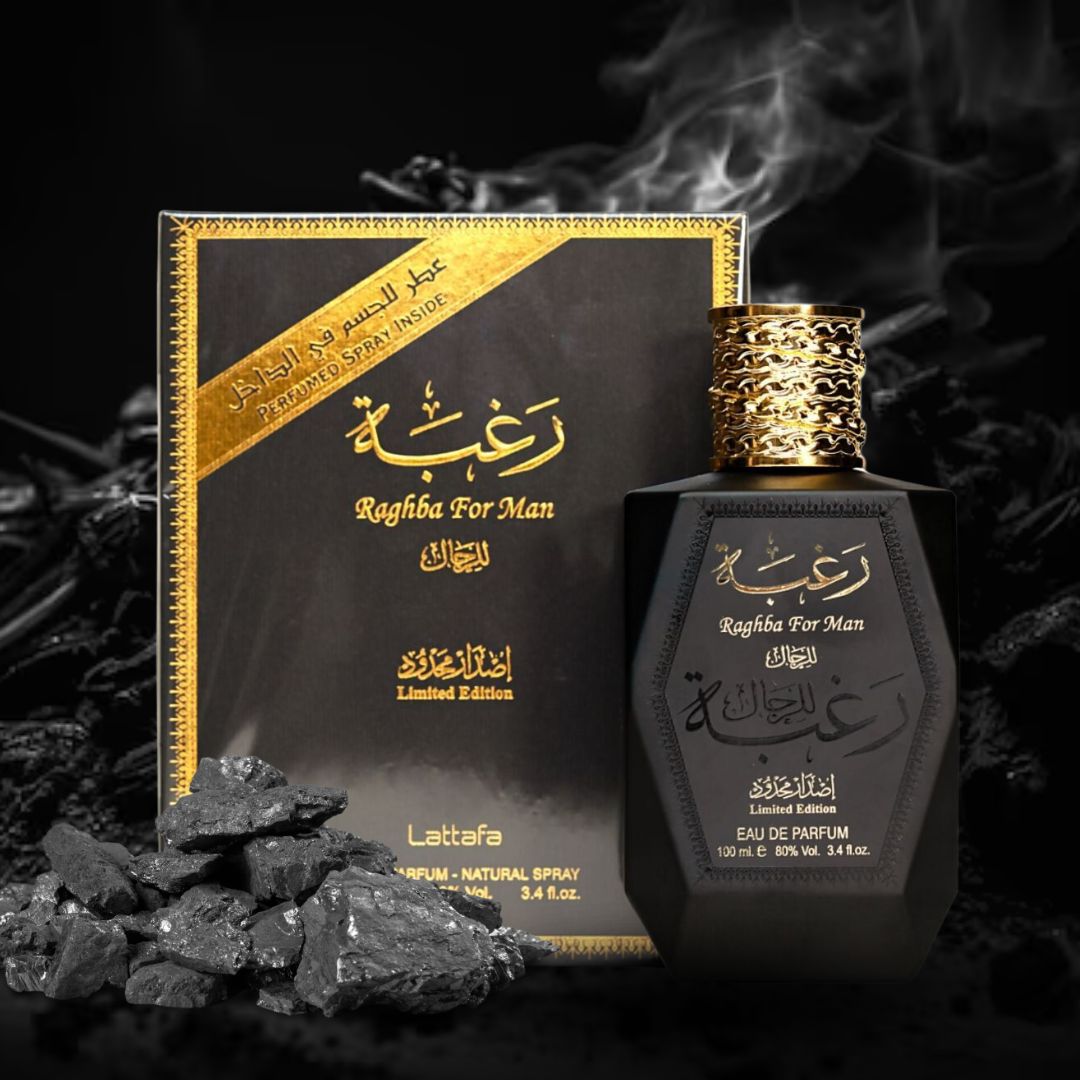 Lattafa Raghba for Men Limited Edition bottle and box with smoky charcoal backdrop