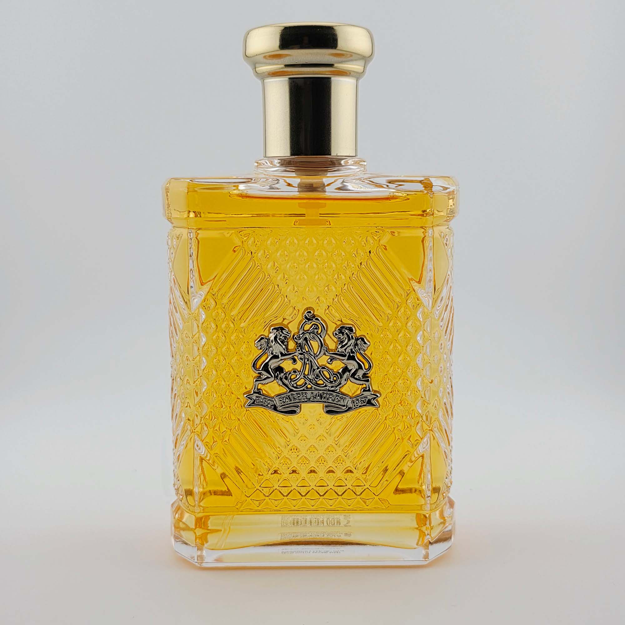 Safari by Ralph Lauren EDT bottle upright with intricate amber glass design